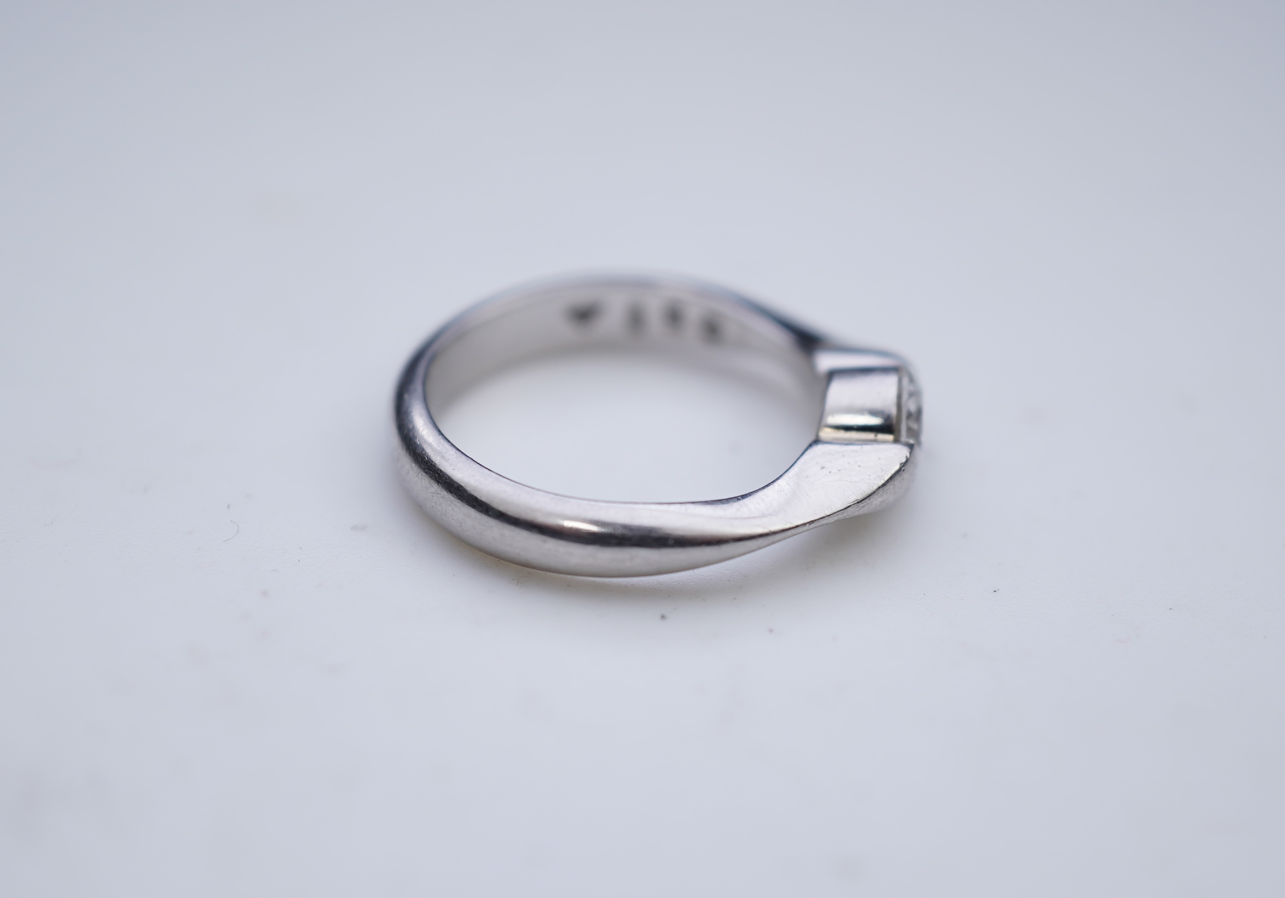A diamond solitaire ring